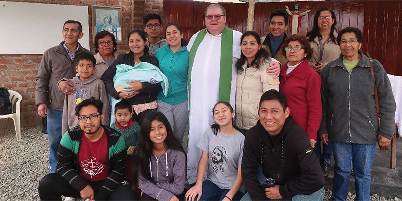 Fr. George Hogarty with the parishioners of the Sacred Heart of Jesus. 