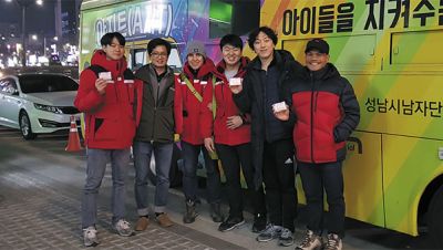 Fr. Vincenzo and his team with the bus