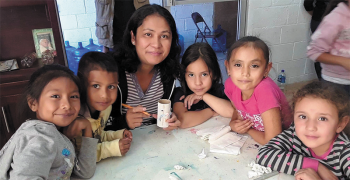 Rosalia working with children